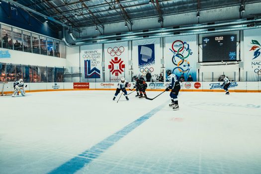 Kunstschaatsen Olympische Spelen 2026 met schaatsster tijdens vrije kür in volle arena